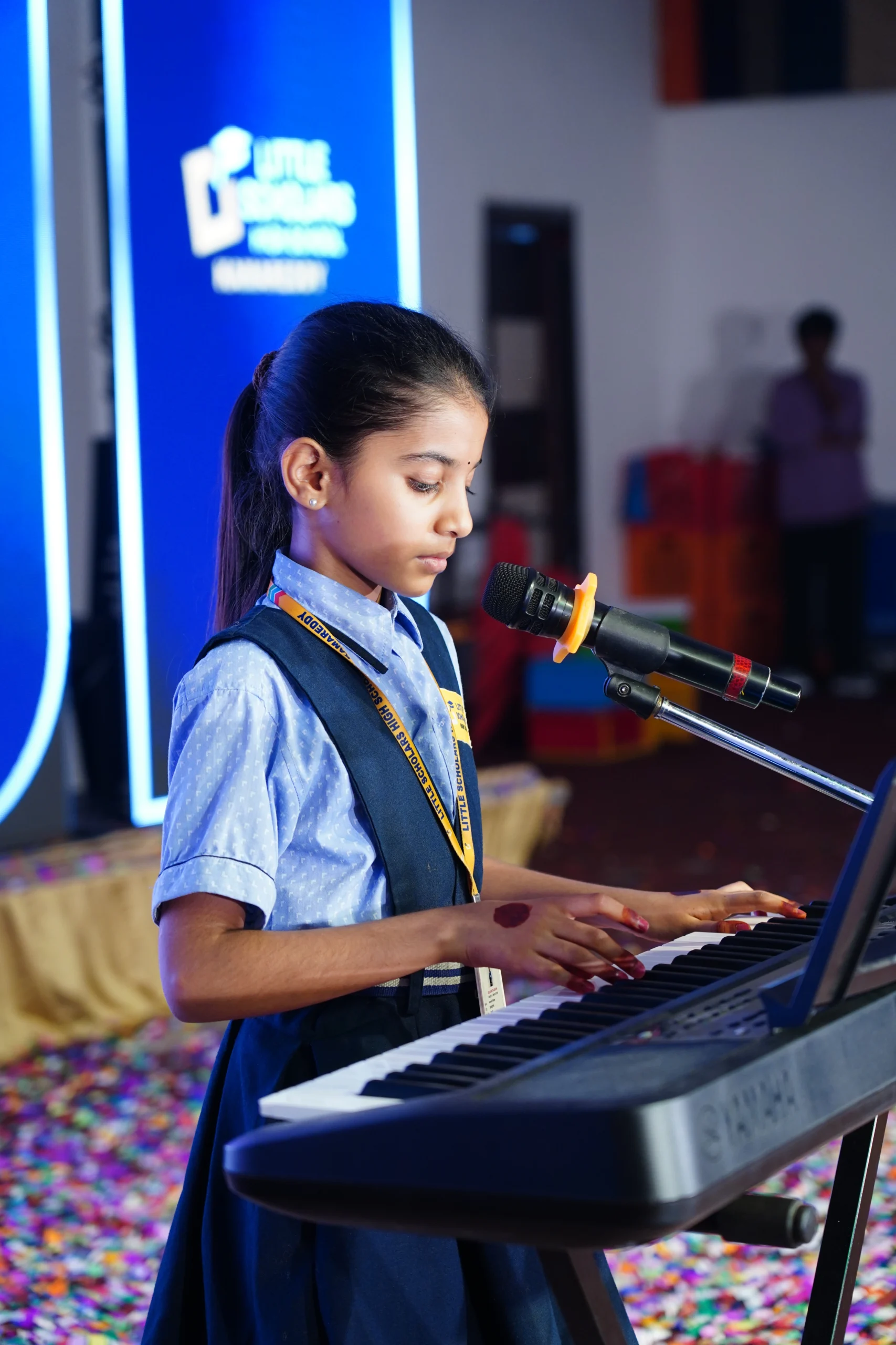 Students participating in a music session at Little Scholar School